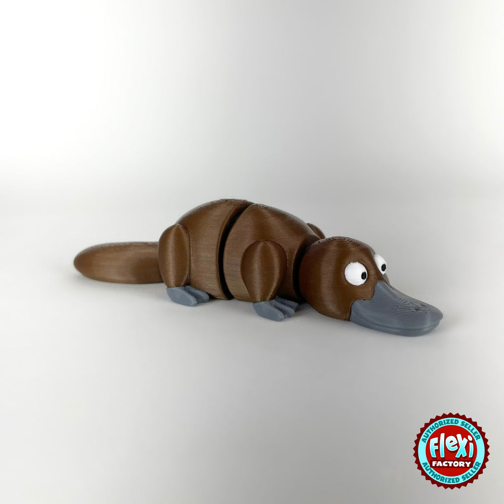 Cute platypus keychain, 3D printed by RU3D – brown three quarter view facing right. Brown with grey bill, also in cream.