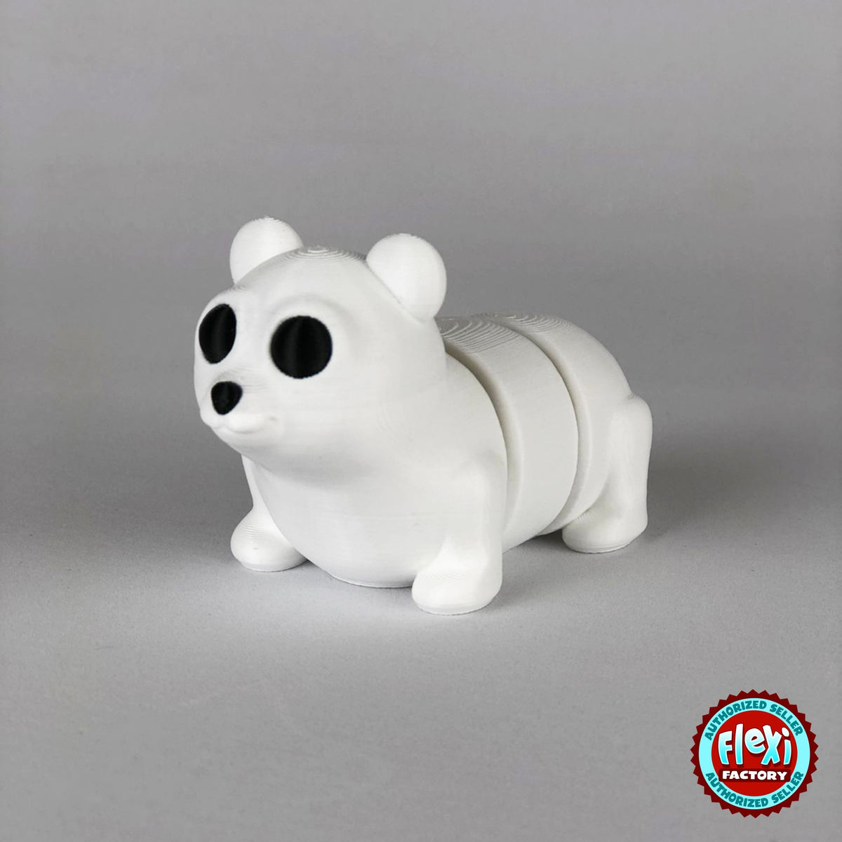 Cute polar bear keychain, 3D printed by RU3D – dark eyes three quarter view facing left. White.