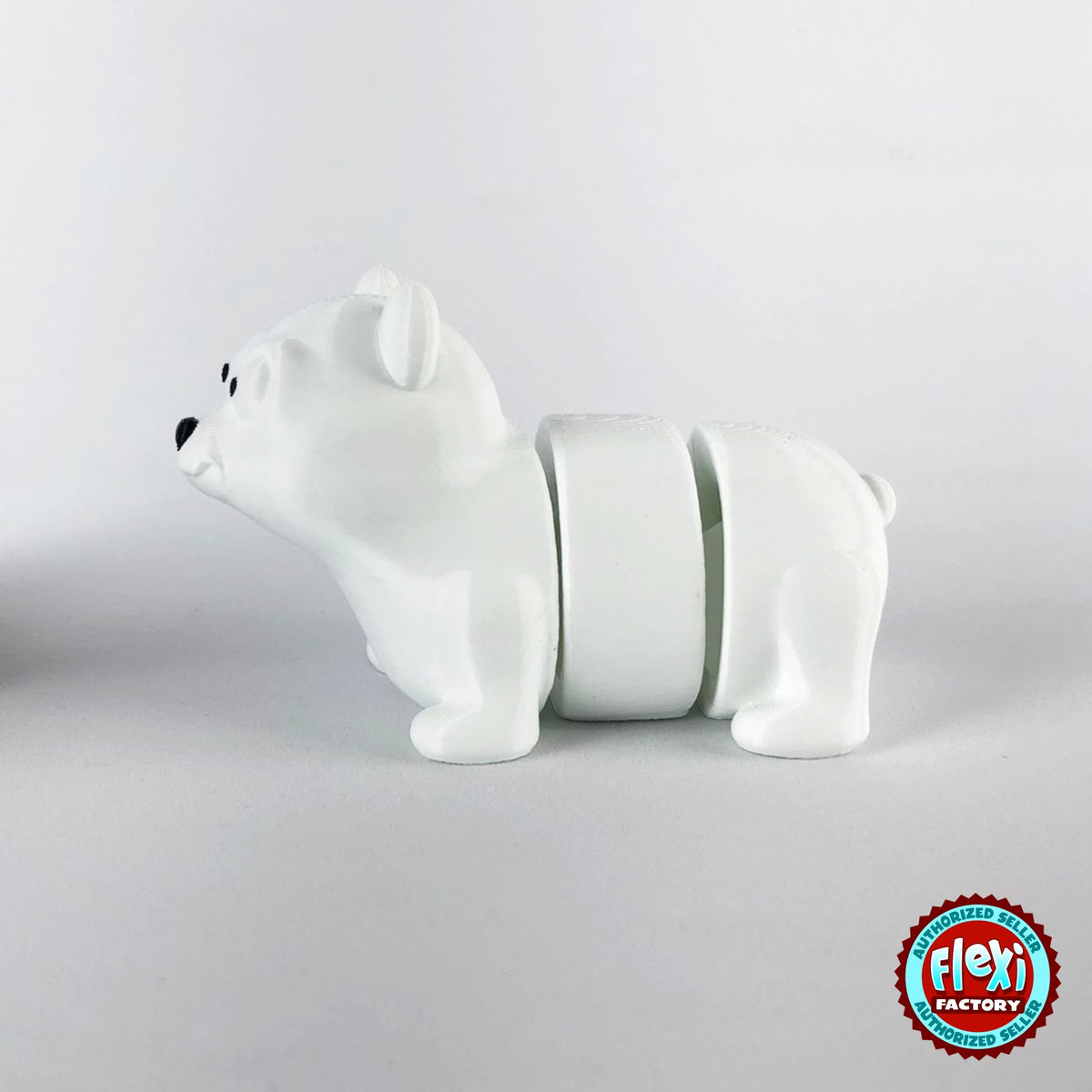 Cute polar bear keychain, 3D printed by RU3D – side view facing left. White.