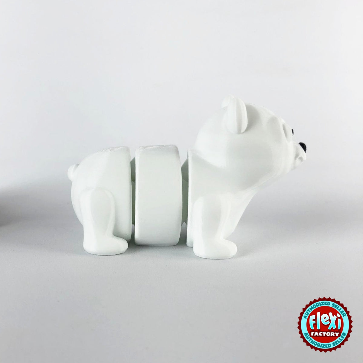 Cute polar bear keychain, 3D printed by RU3D – side view facing right. White.