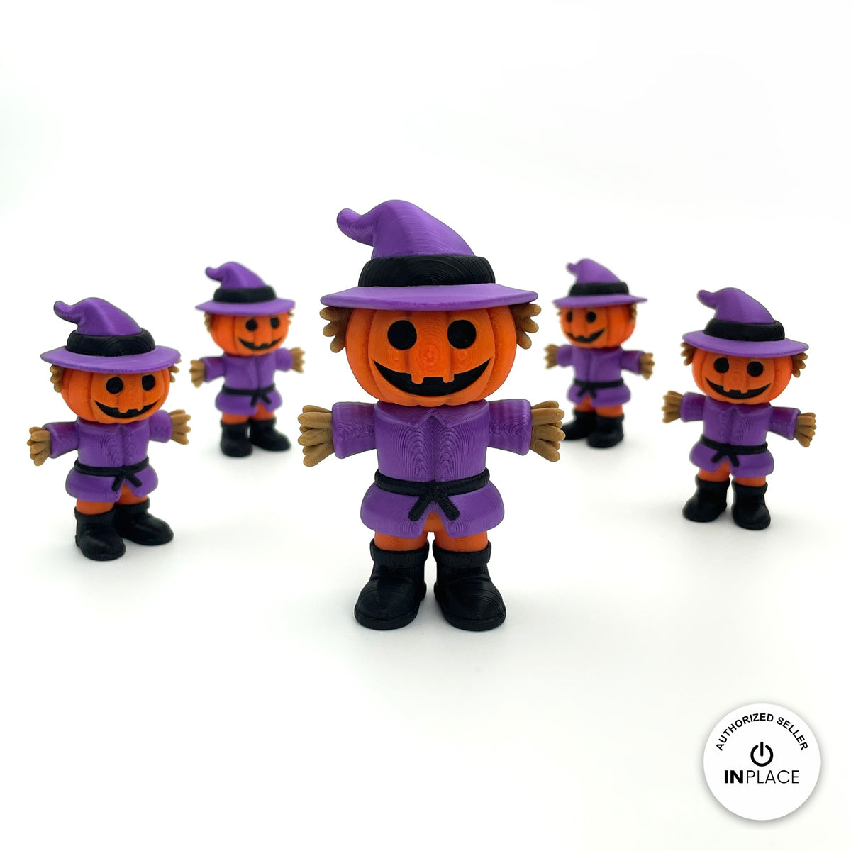 Cute pumpkin scarecrow keychain, 3D printed by RU3D – group of scarecrows. Orange pumpkin head with purple hat and outfit.