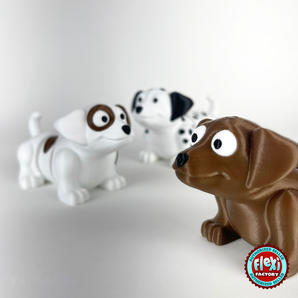 Cute puppy dog keychain, 3D printed by RU3D – brown puppy close up with friends. White with brown patches, also in brown.
