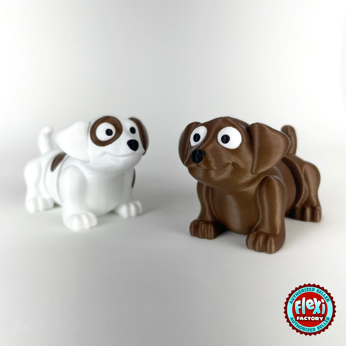 Cute puppy dog keychain, 3D printed by RU3D – pair of puppies front view. White with brown patches, also in brown.