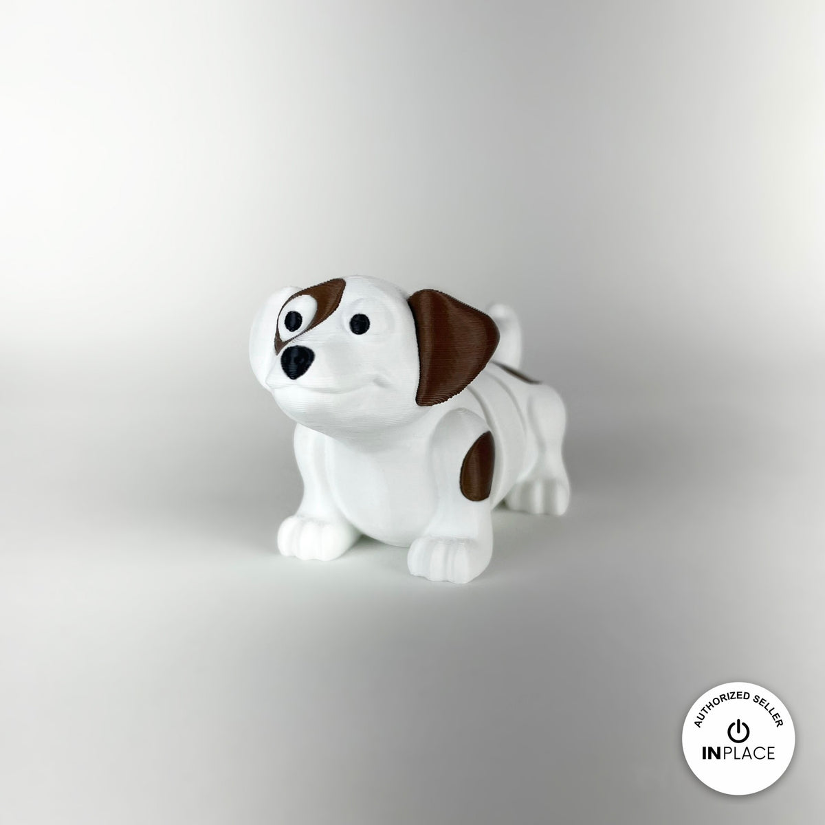Cute puppy dog keychain, 3D printed by RU3D – white puppy front view. White with brown patches, also in brown.