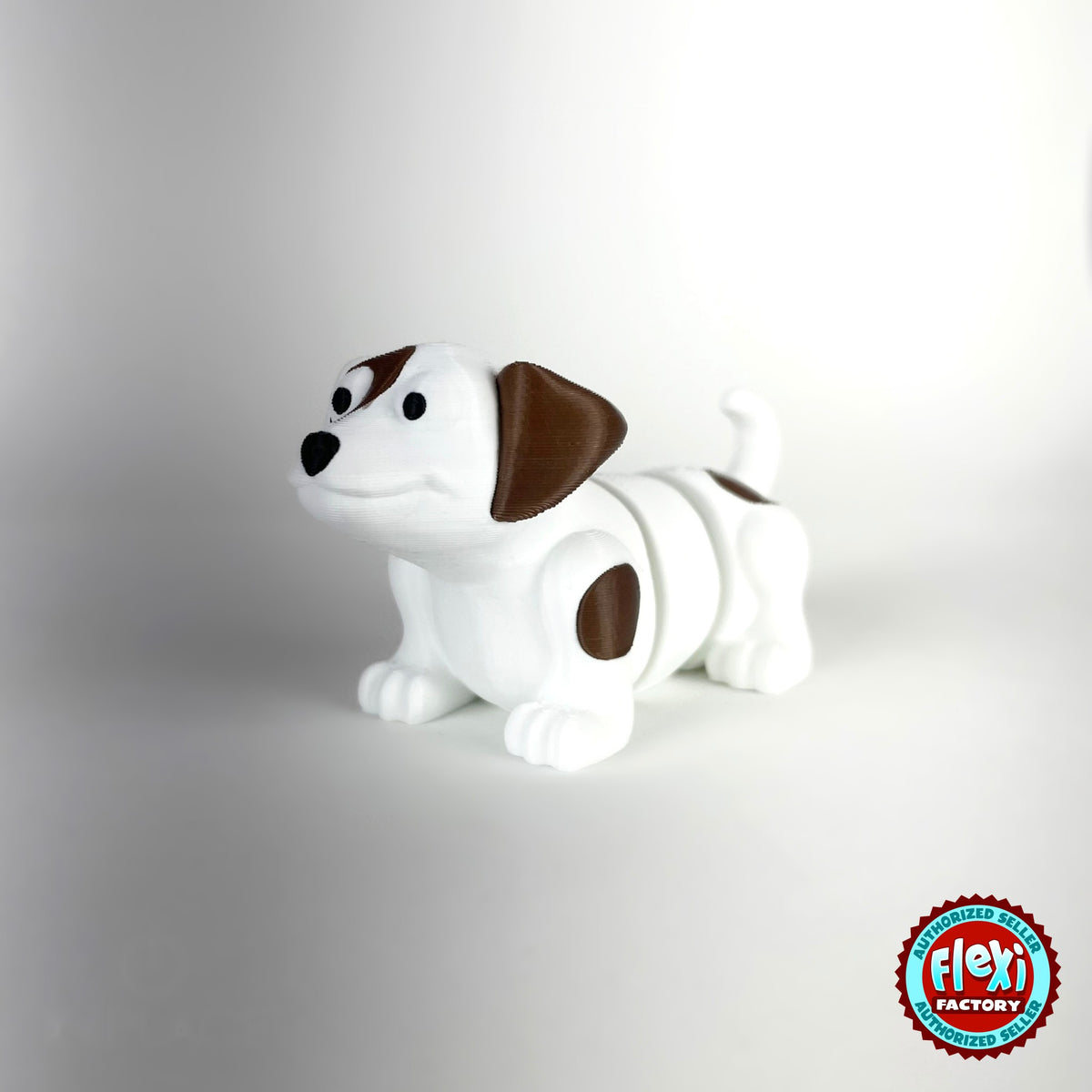 Cute puppy dog keychain, 3D printed by RU3D – white puppy three quarter view facing left. White with brown patches, also in brown.