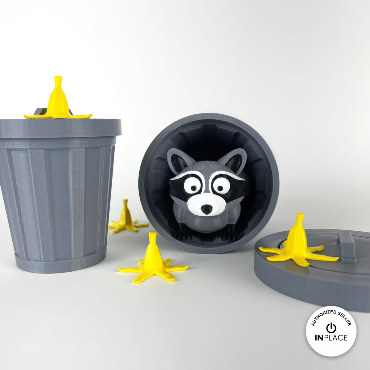 3D printed trash can platform by RU3D, shown with the Raccoon keychain