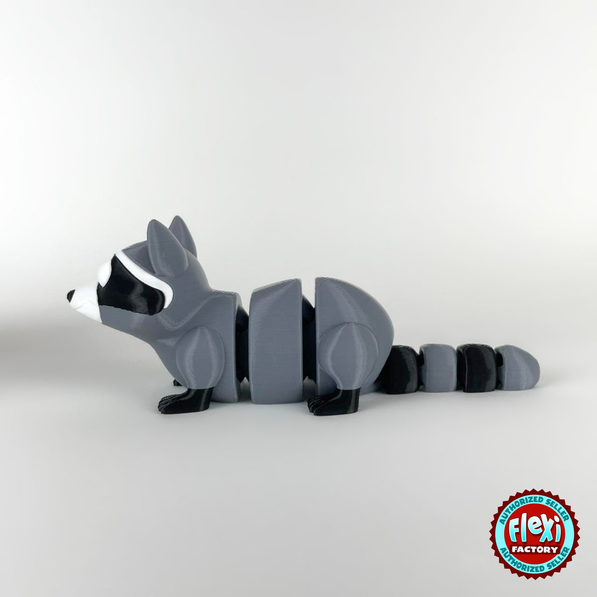 Cute raccoon keychain, 3D printed by RU3D – side view facing left. Grey and black with trash can playset.