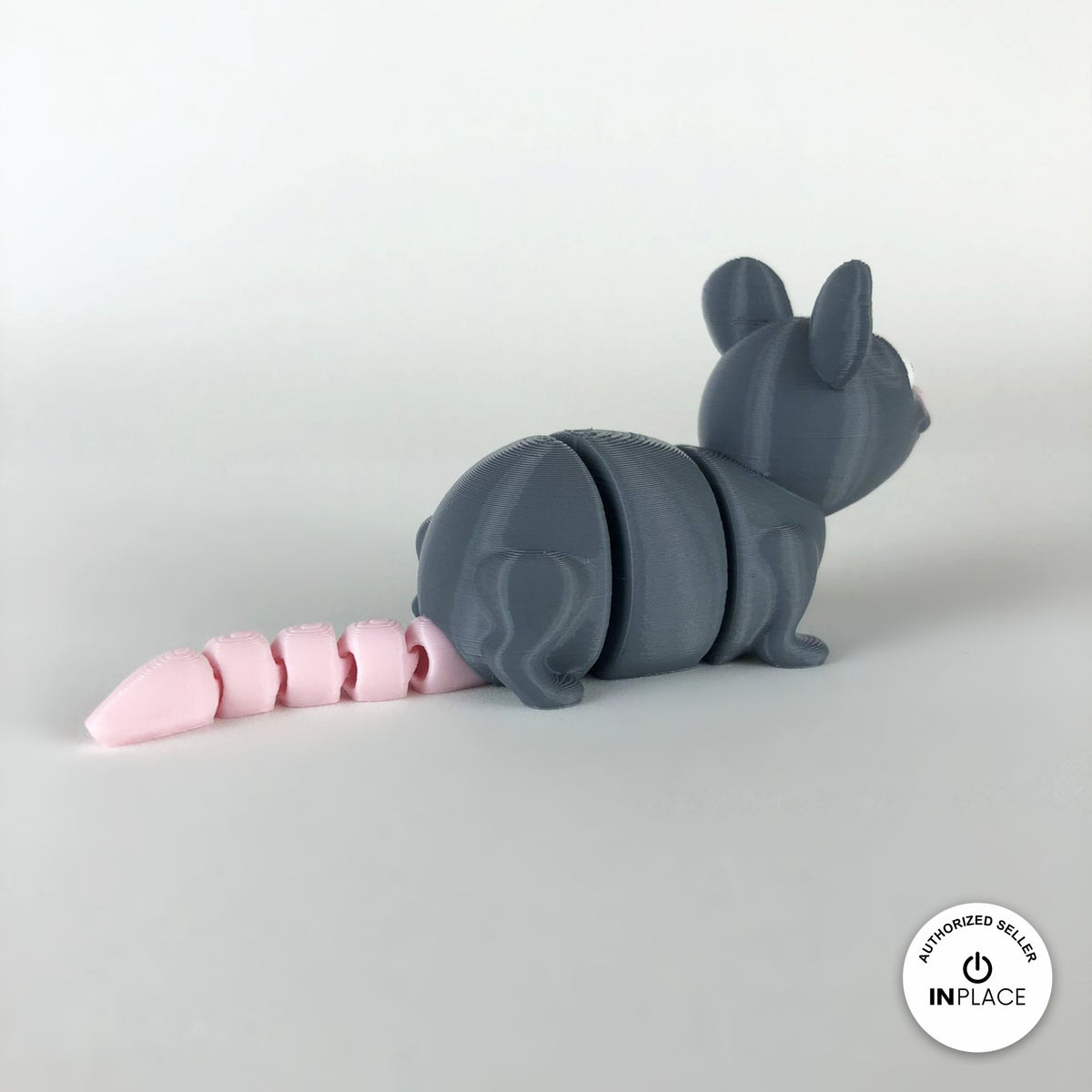 Cute rat keychain, 3D printed by RU3D – rear view with tail. Grey with pink ears and tail.