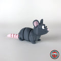 Cute rat keychain, 3D printed by RU3D – three quarter view facing right. Grey with pink ears and tail.