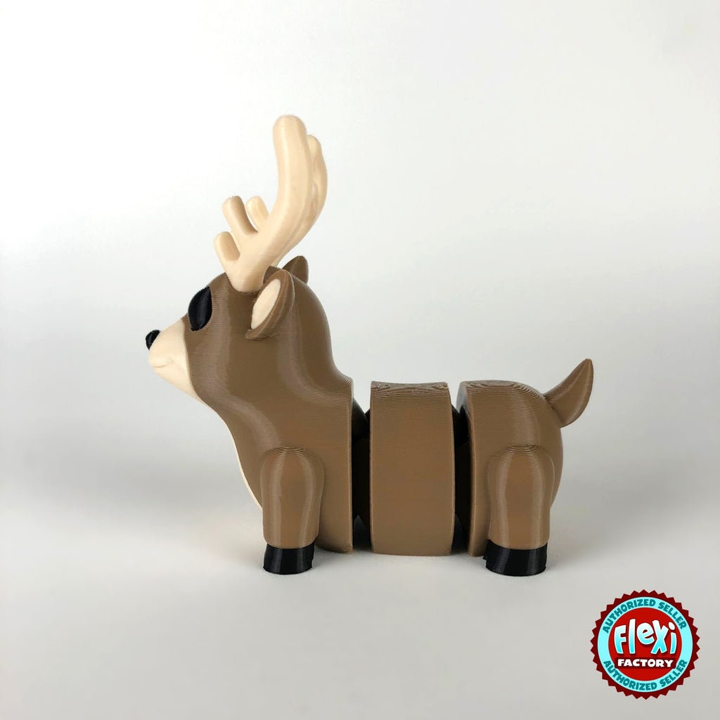 Cute reindeer keychain, 3D printed by RU3D – dark eyes side view facing left. Brown with cream antlers and chest.