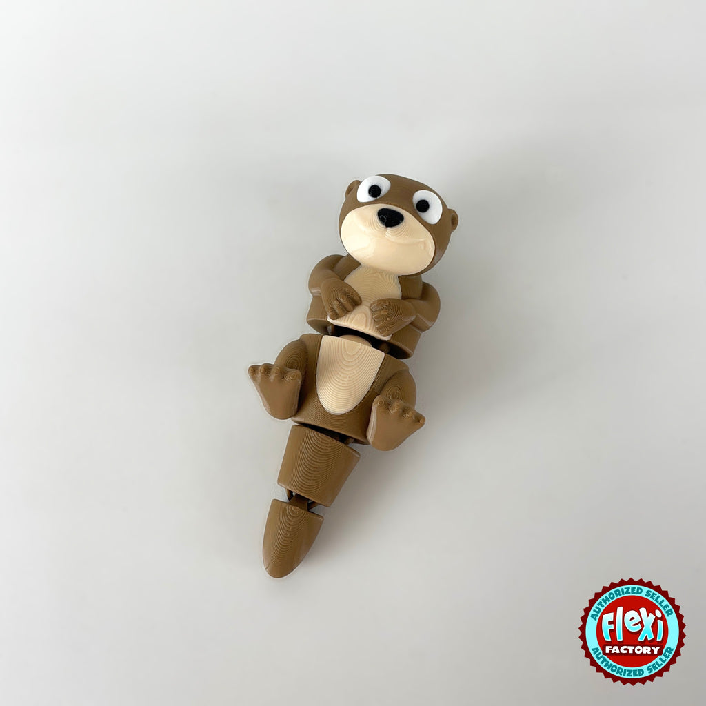 Cute river otter keychain, 3D printed by RU3D – floating on back top view. Brown with cream belly.
