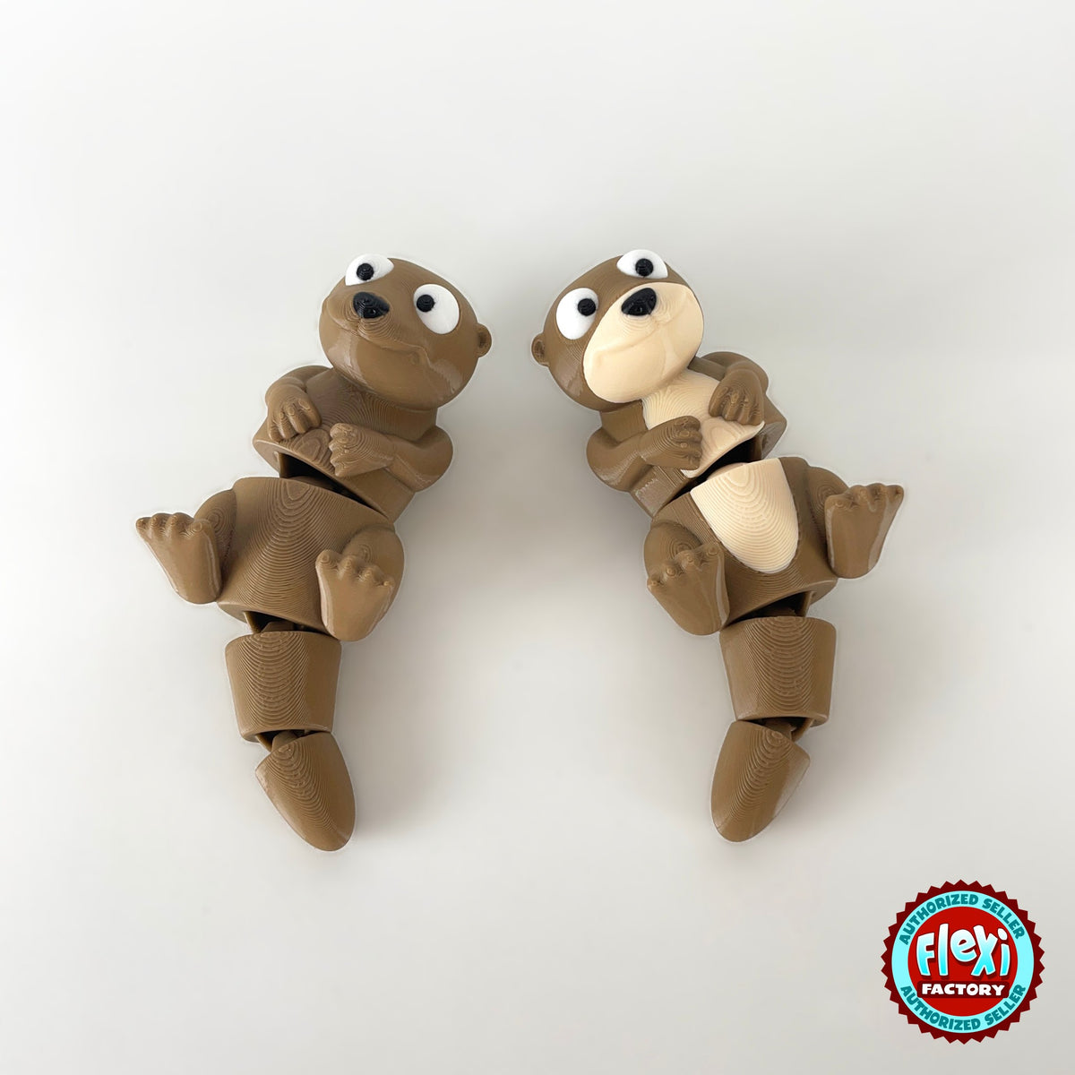 Cute river otter keychain, 3D printed by RU3D – pair of otters top view. Brown with cream belly.
