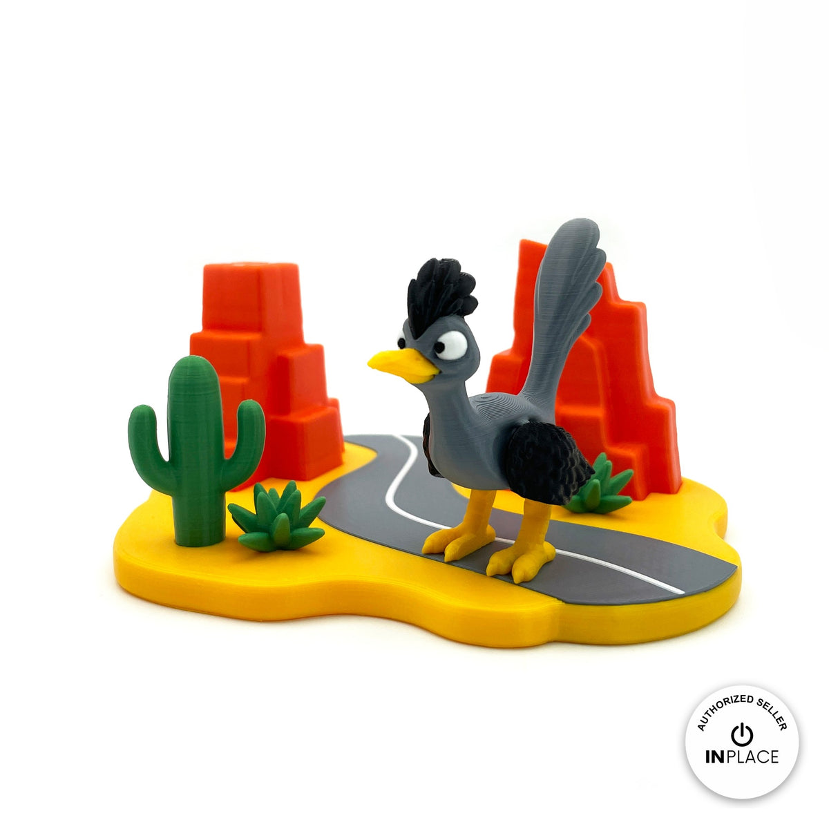 3D printed desert highway platform by RU3D, shown with the Road Runner keychain