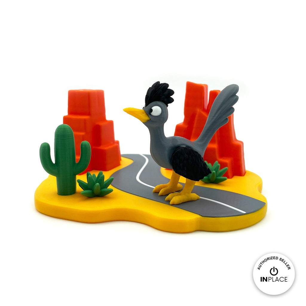 3D printed desert highway platform by RU3D, shown with the Road Runner keychain