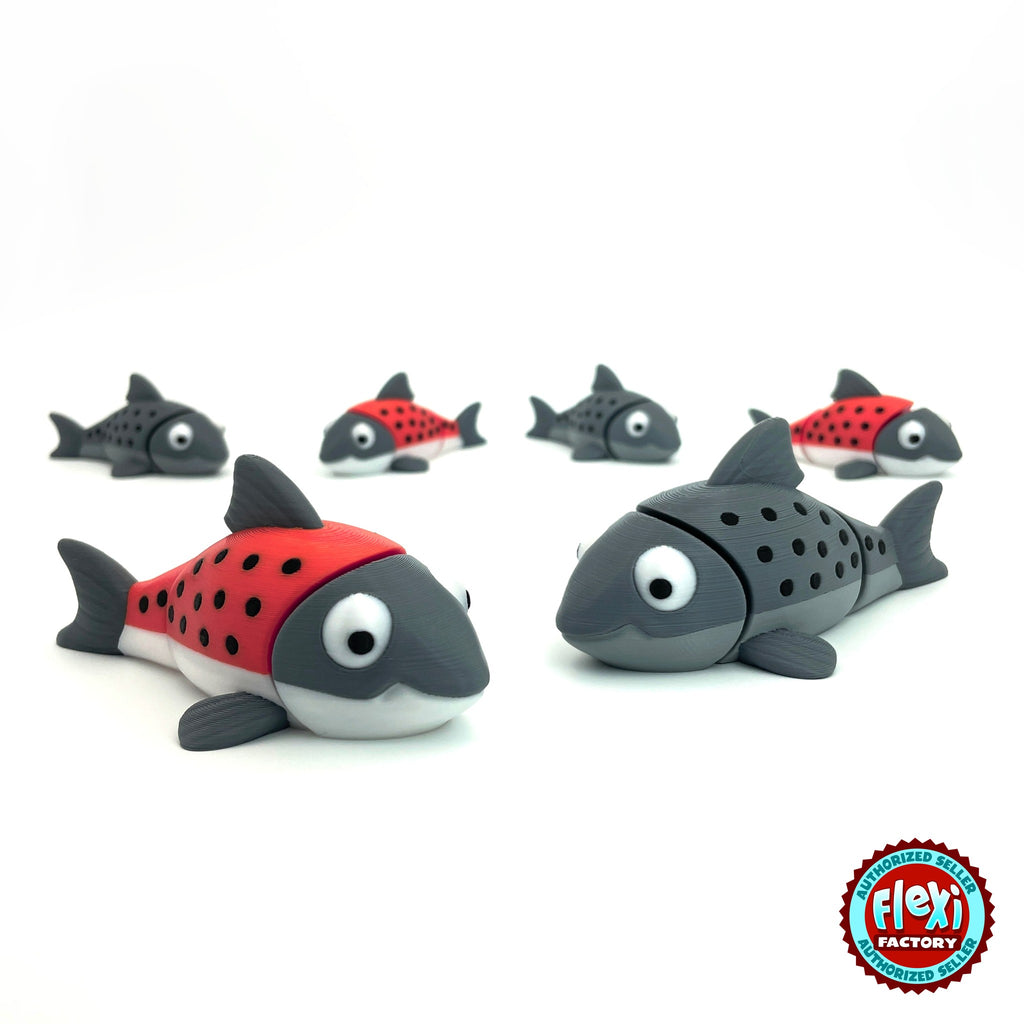 Cute salmon fish keychain, 3D printed by RU3D – group of salmon. Red and grey with black spots, also all grey.
