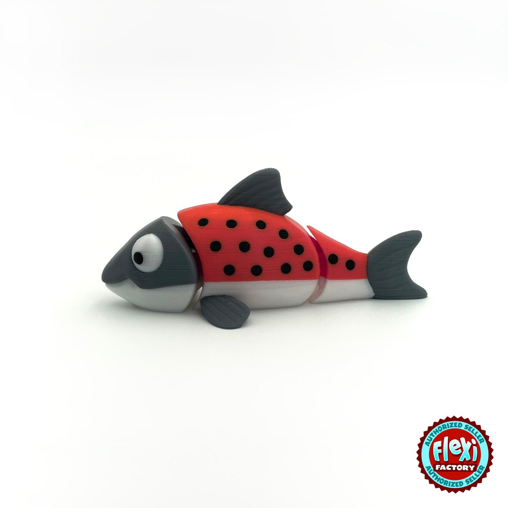Cute salmon fish keychain, 3D printed by RU3D – red salmon side view facing left. Red and grey with black spots, also all grey.
