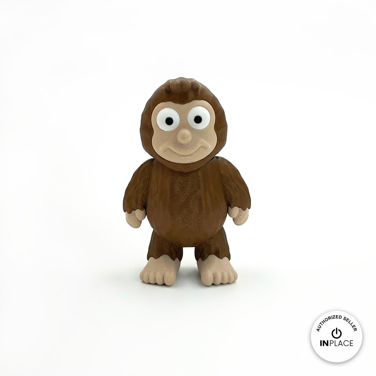 Cute sasquatch Bigfoot keychain, 3D printed by RU3D – standing front view. Dark brown fur with tan face and feet.