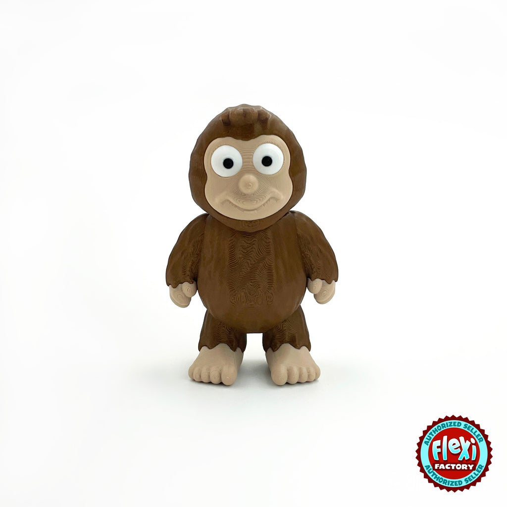 Cute sasquatch Bigfoot keychain, 3D printed by RU3D – standing front view. Dark brown fur with tan face and feet.
