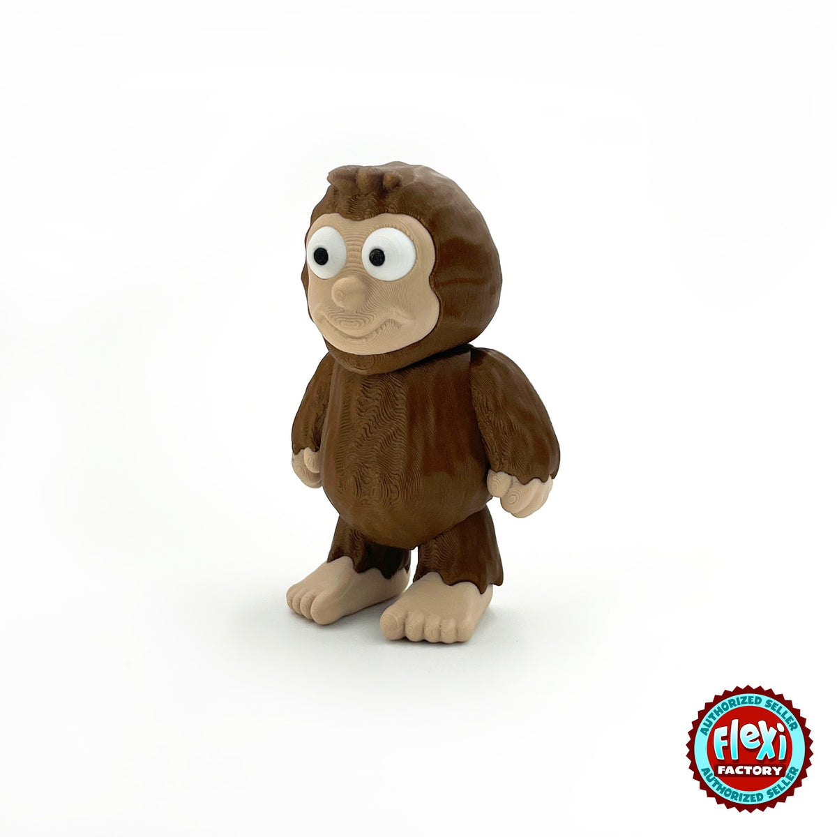 Cute sasquatch Bigfoot keychain, 3D printed by RU3D – three quarter view facing left. Dark brown fur with tan face and feet.