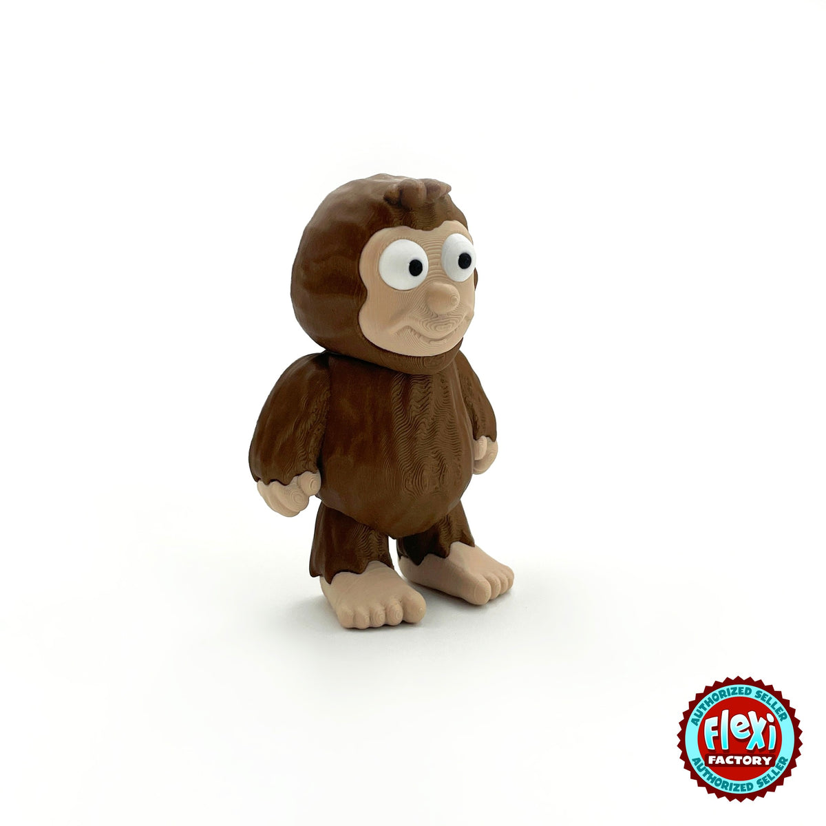 Cute sasquatch Bigfoot keychain, 3D printed by RU3D – three quarter view facing right. Dark brown fur with tan face and feet.