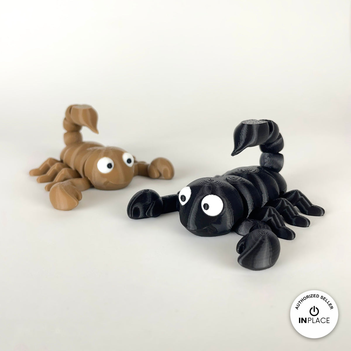 Cute scorpion keychain, 3D printed by RU3D – black and tan scorpions. Black, also in tan brown.