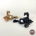 Cute scorpion keychain, 3D printed by RU3D – black and tan scorpions. Black, also in tan brown.