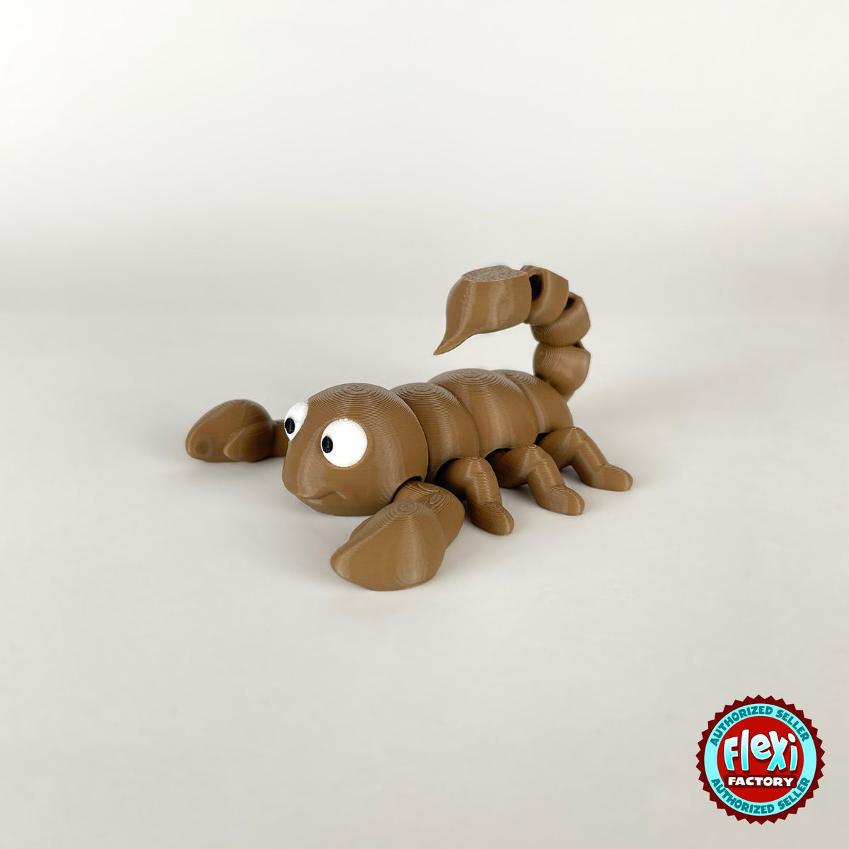 Cute scorpion keychain, 3D printed by RU3D – tan three quarter view facing left. Black, also in tan brown.