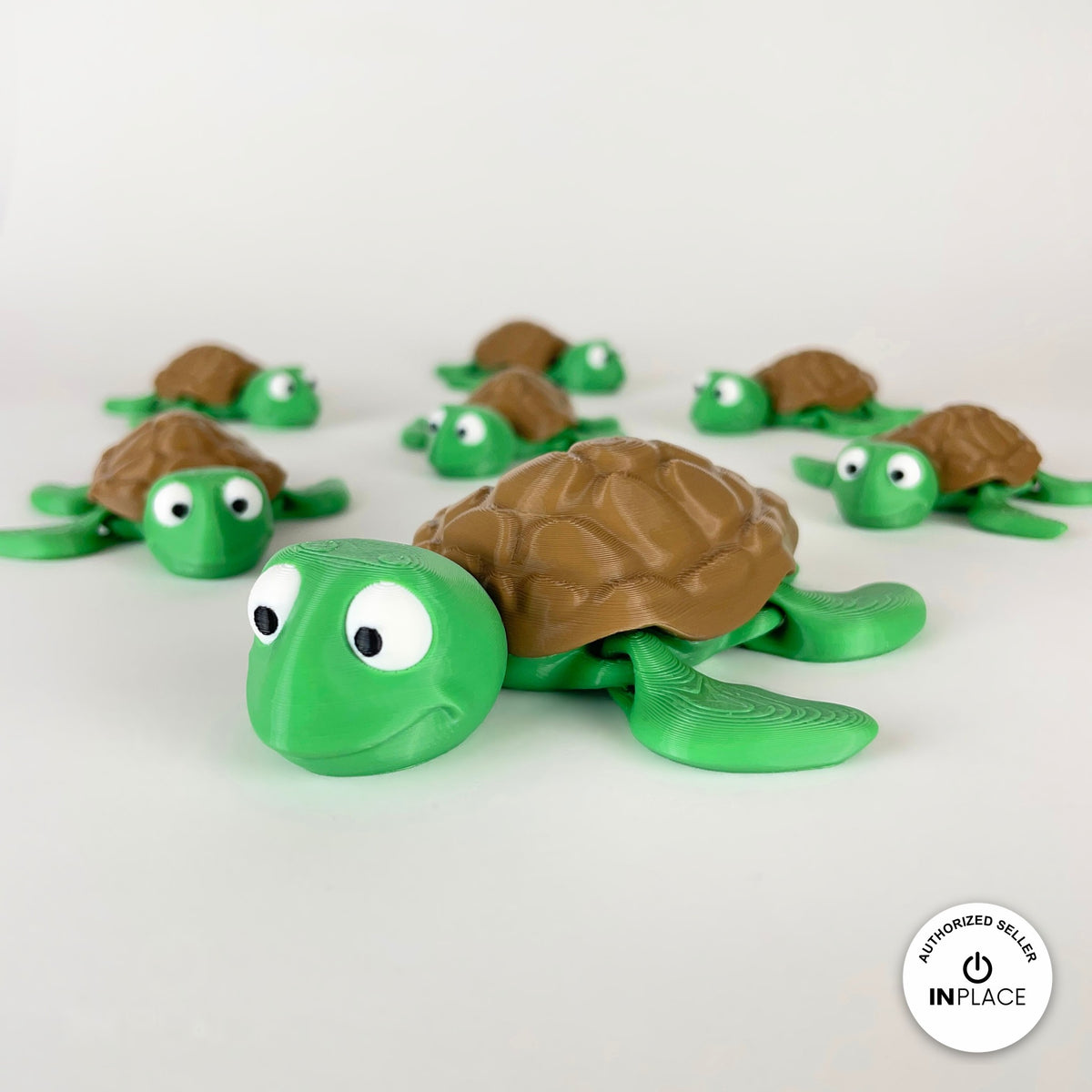 Cute sea turtle keychain, 3D printed by RU3D – group of sea turtles. Green with brown shell.