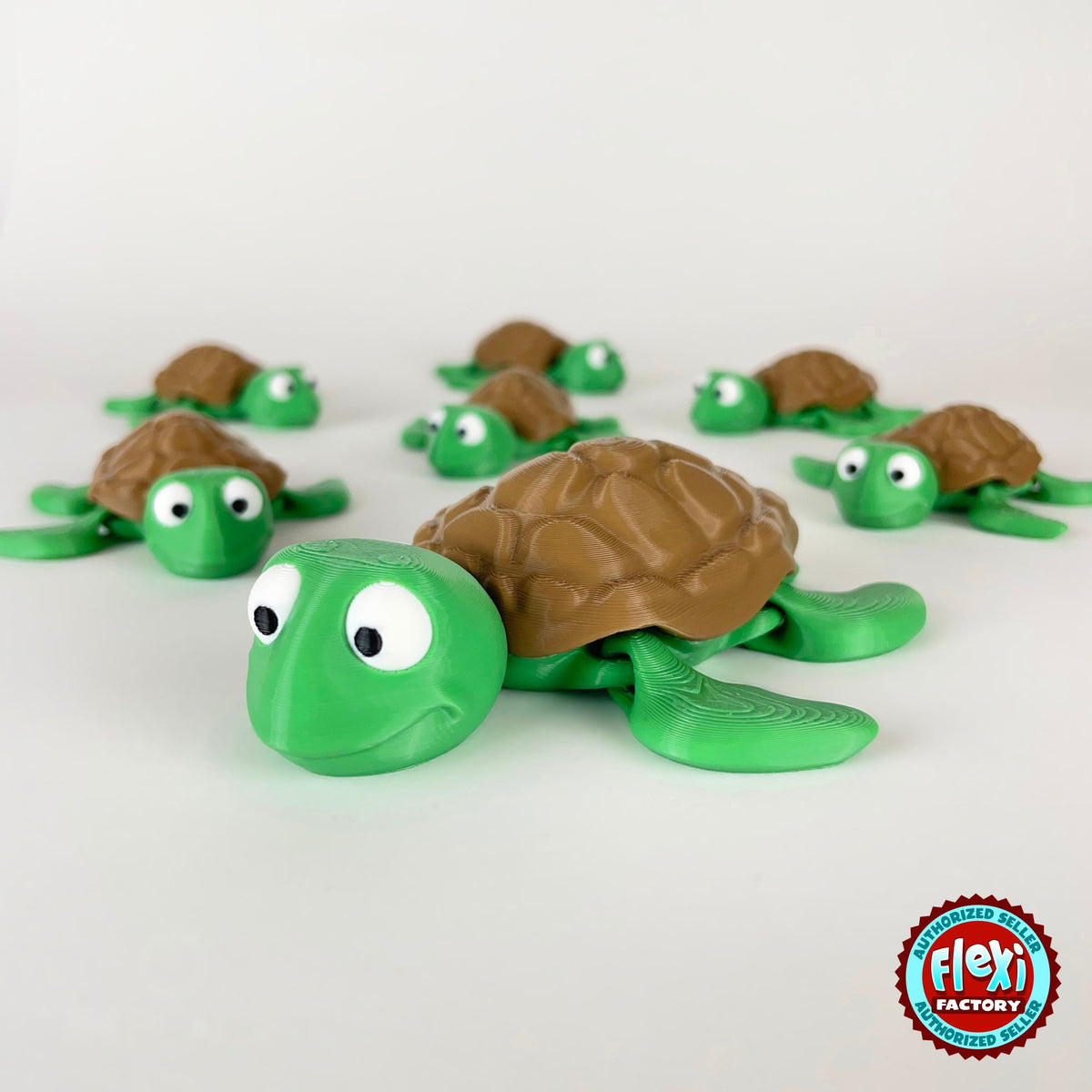 Cute sea turtle keychain, 3D printed by RU3D – group of sea turtles. Green with brown shell.