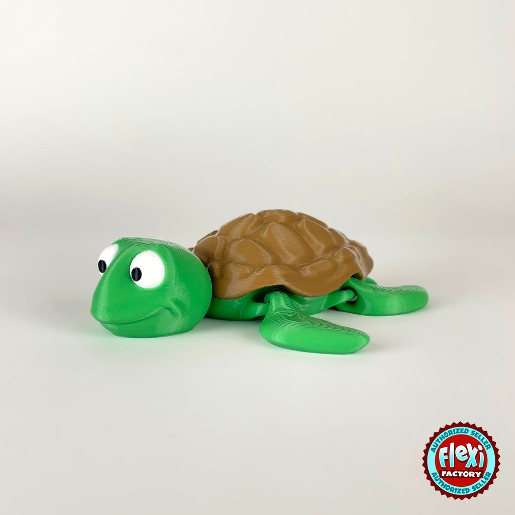 Cute sea turtle keychain, 3D printed by RU3D – three quarter view facing left. Green with brown shell.