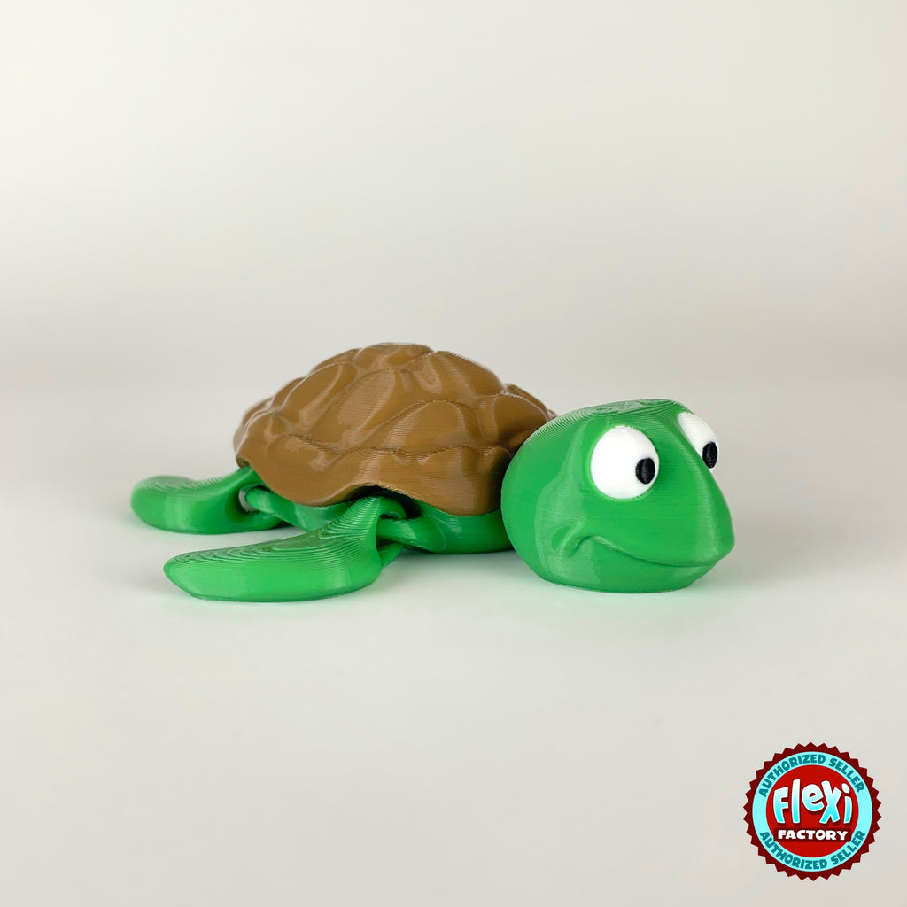 Cute sea turtle keychain, 3D printed by RU3D – three quarter view facing right. Green with brown shell.