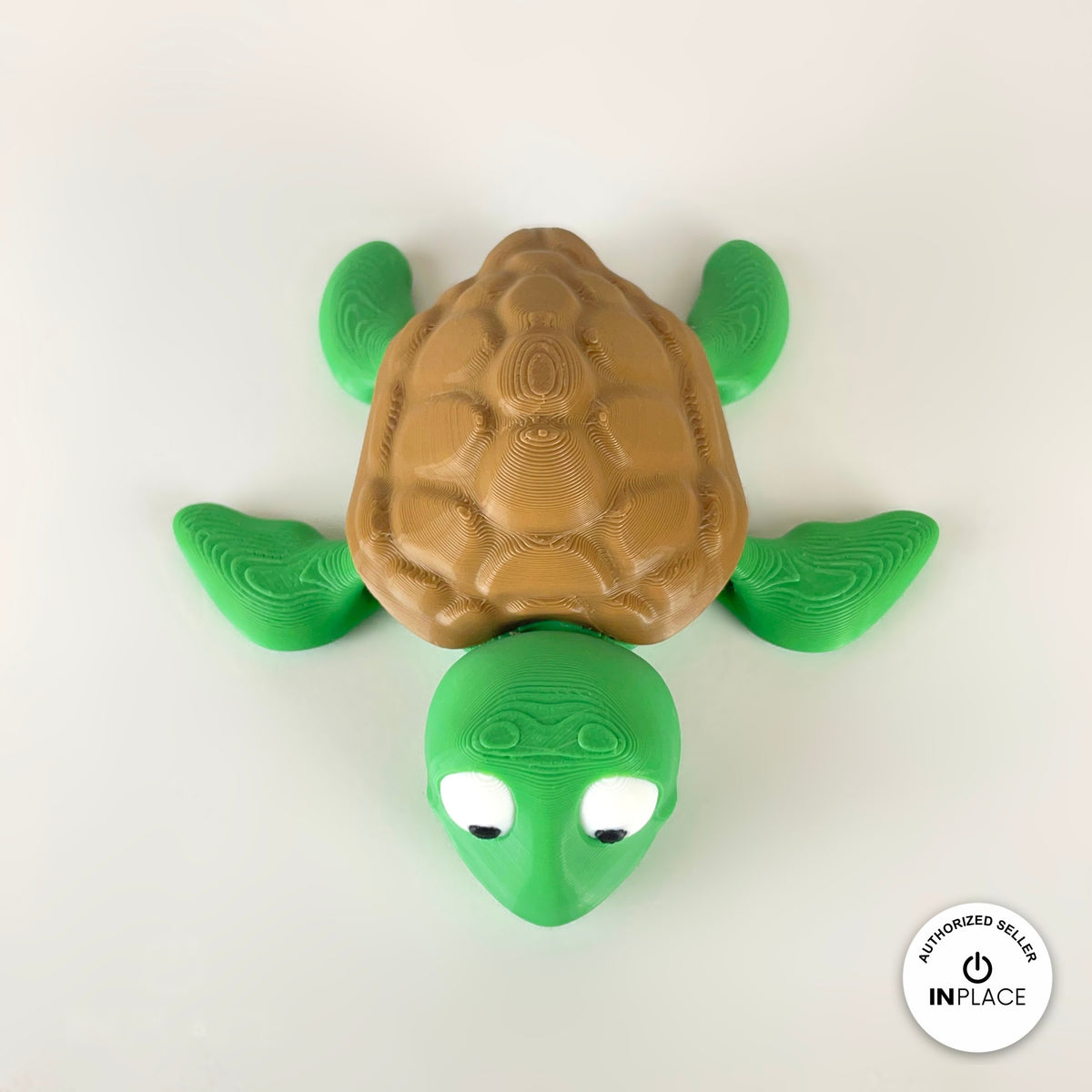 Cute sea turtle keychain, 3D printed by RU3D – top view flippers out. Green with brown shell.