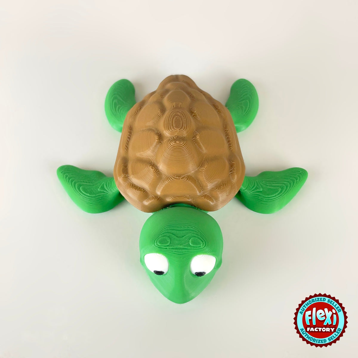 Cute sea turtle keychain, 3D printed by RU3D – top view flippers out. Green with brown shell.