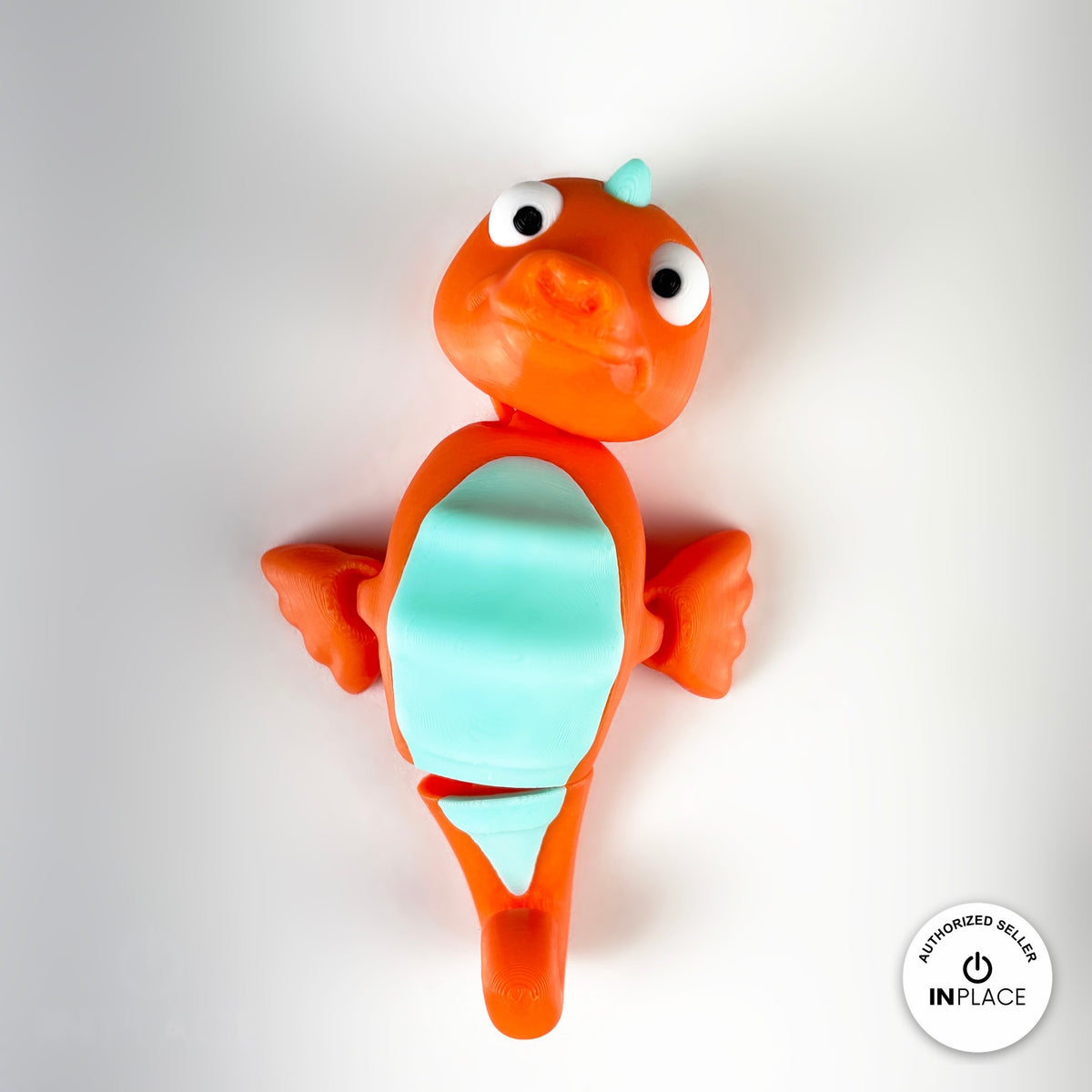 Cute seahorse keychain, 3D printed by RU3D – front view fins out. Orange with mint belly, also pink and yellow.