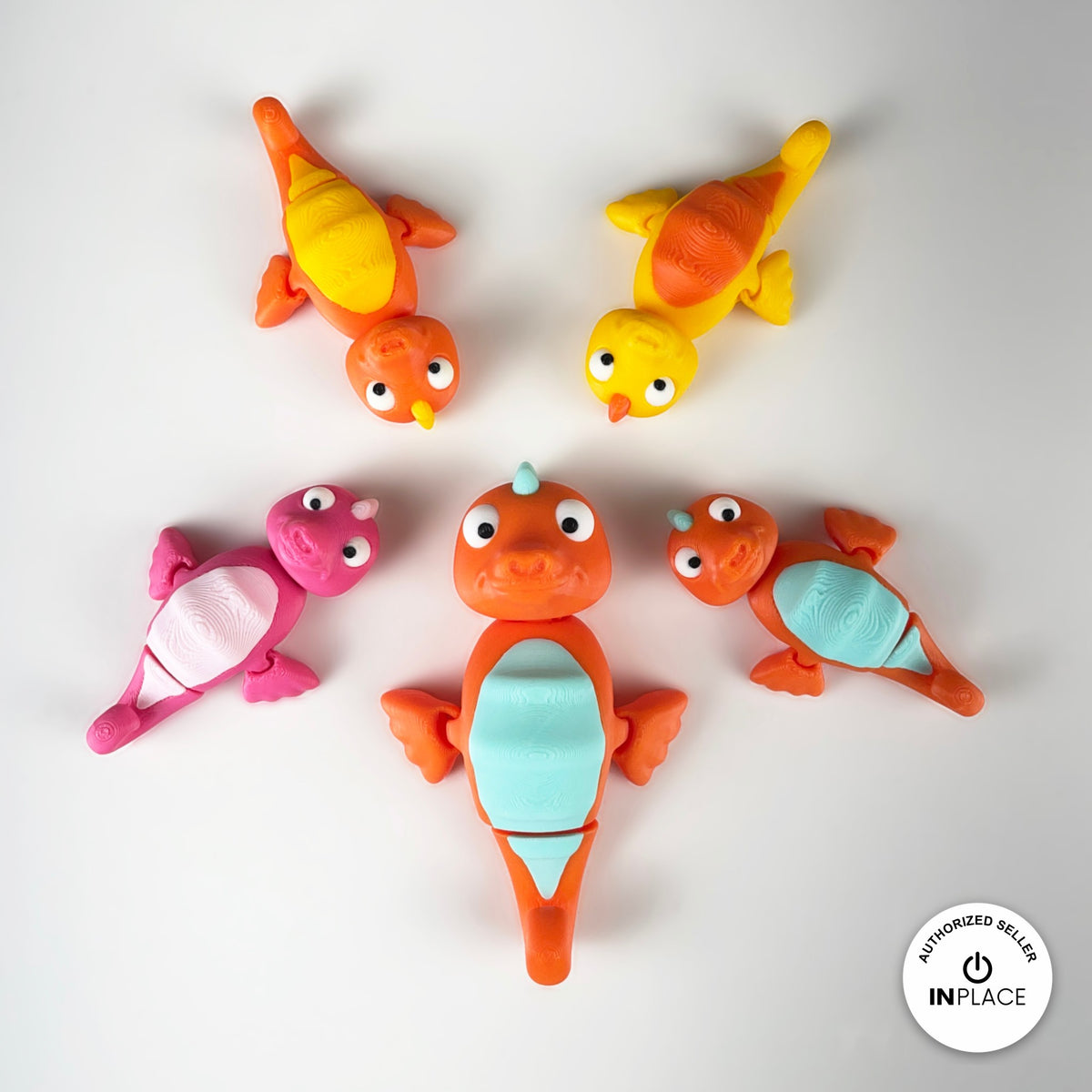 Cute seahorse keychain, 3D printed by RU3D – group of colourful seahorses. Orange with mint belly, also pink and yellow.