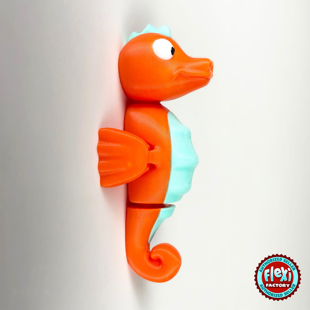 Cute seahorse keychain, 3D printed by RU3D – side view facing right. Orange with mint belly, also pink and yellow.