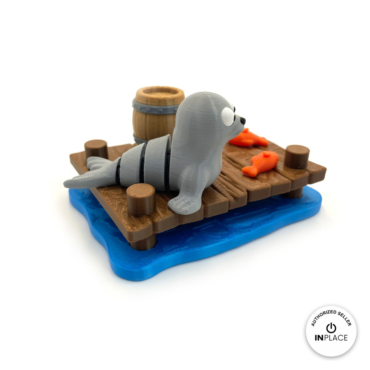 3D printed harbour dock platform by RU3D, shown with the Seal keychain