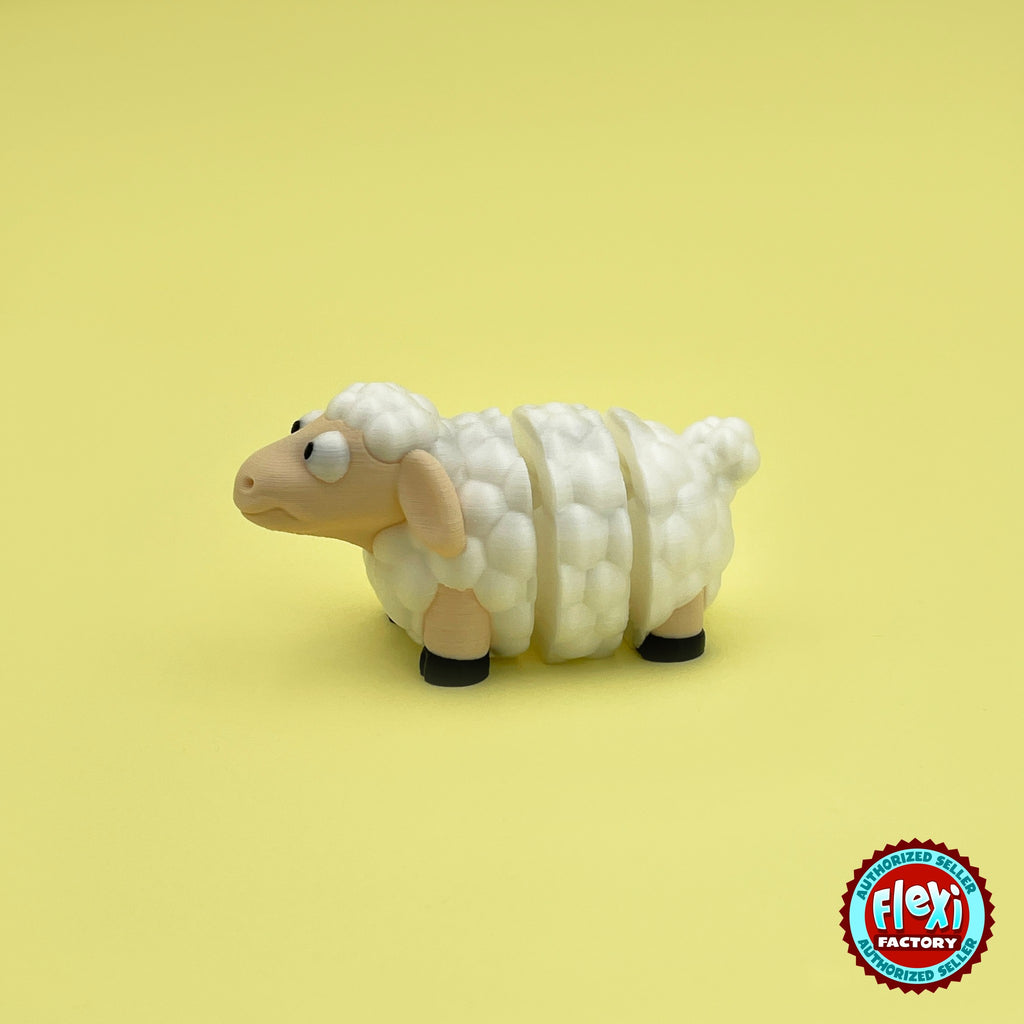 Cute sheep keychain, 3D printed by RU3D – side view facing left. Cream fluffy wool with black hooves.