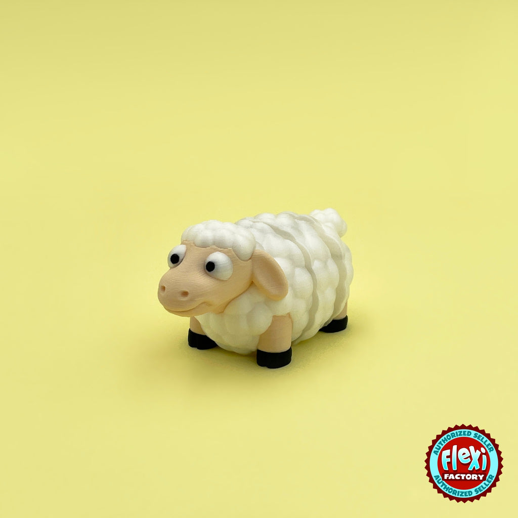 Cute sheep keychain, 3D printed by RU3D – three quarter view facing left. Cream fluffy wool with black hooves.