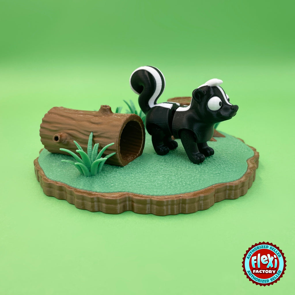 Cute skunk keychain, 3D printed by RU3D – by hollow log on woodland playset. Black and white with woodland log playset.
