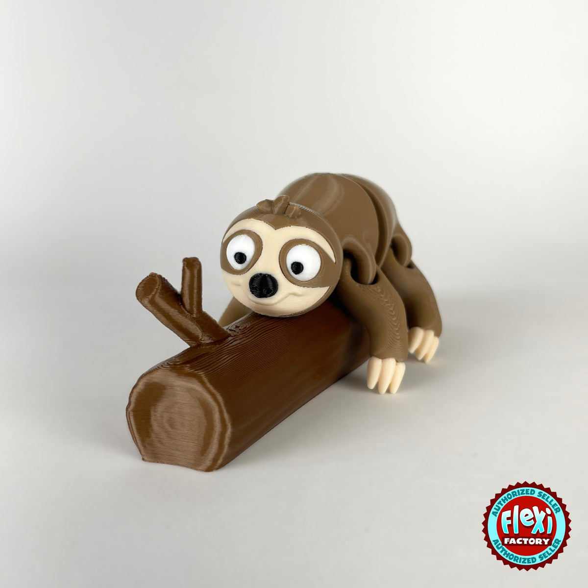 Cute sloth keychain, 3D printed by RU3D – hugging branch front view. Brown with cream face hugging a branch.