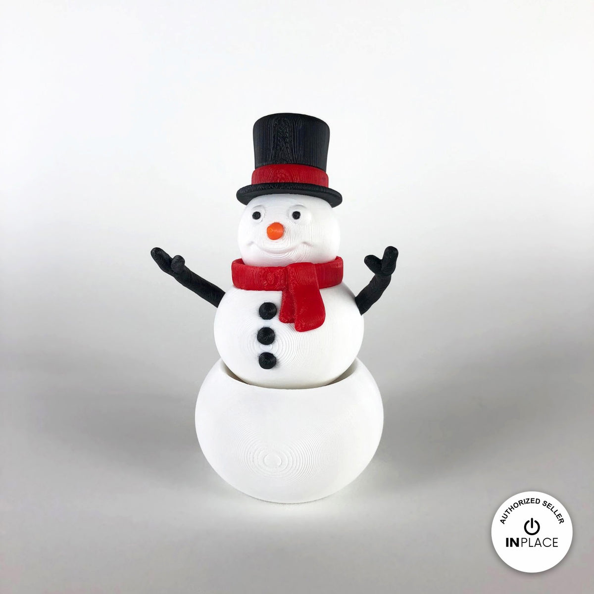 Cute snowman keychain, 3D printed by RU3D – front view arms up. White with black top hat and red scarf.