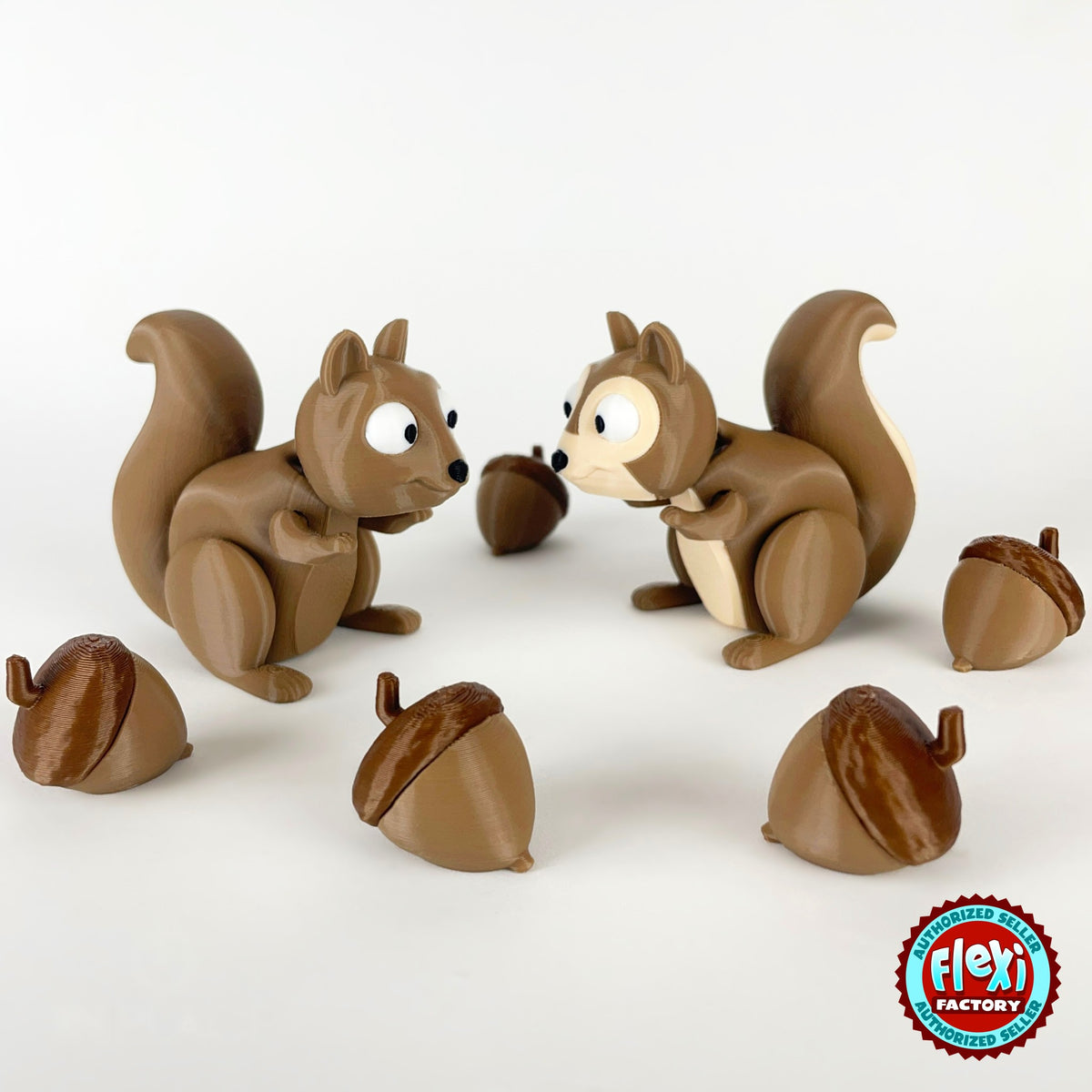 Cute squirrel keychain, 3D printed by RU3D – pair of squirrels with acorns. Brown with cream belly and acorns.