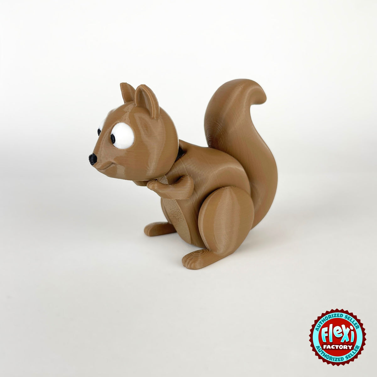 Cute squirrel keychain, 3D printed by RU3D – side view facing left tail up. Brown with cream belly and acorns.