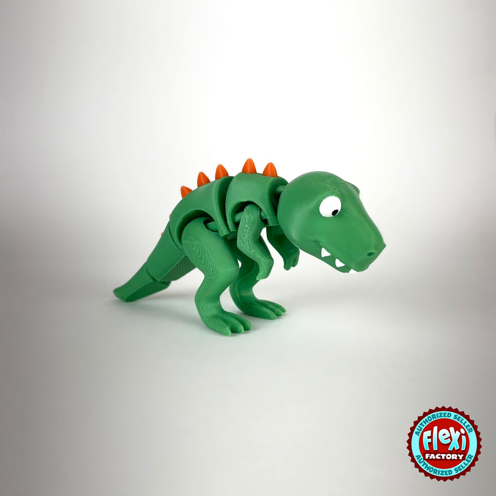 Cute T Rex dinosaur keychain, 3D printed by RU3D – three quarter view facing right. Green with orange spikes.