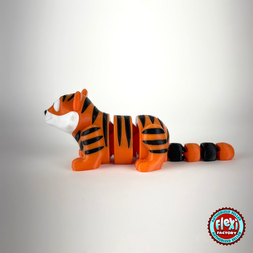 Cute tiger keychain, 3D printed by RU3D – white face side view facing left. Orange with black stripes.