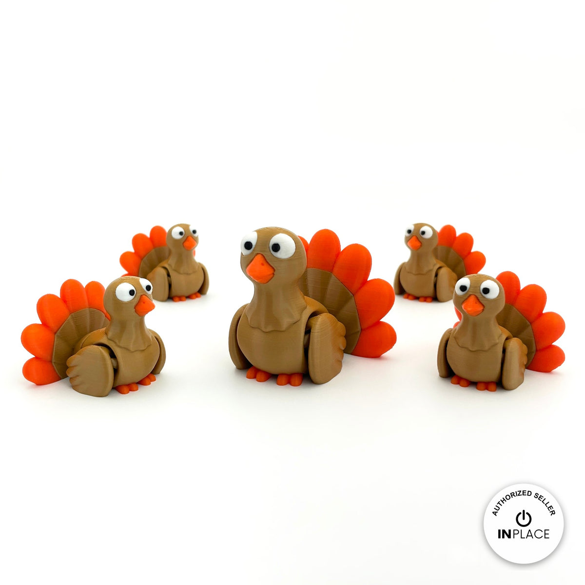 Cute turkey keychain, 3D printed by RU3D – group of turkeys. Brown with orange tail feathers.