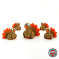 Cute turkey keychain, 3D printed by RU3D – group of turkeys. Brown with orange tail feathers.