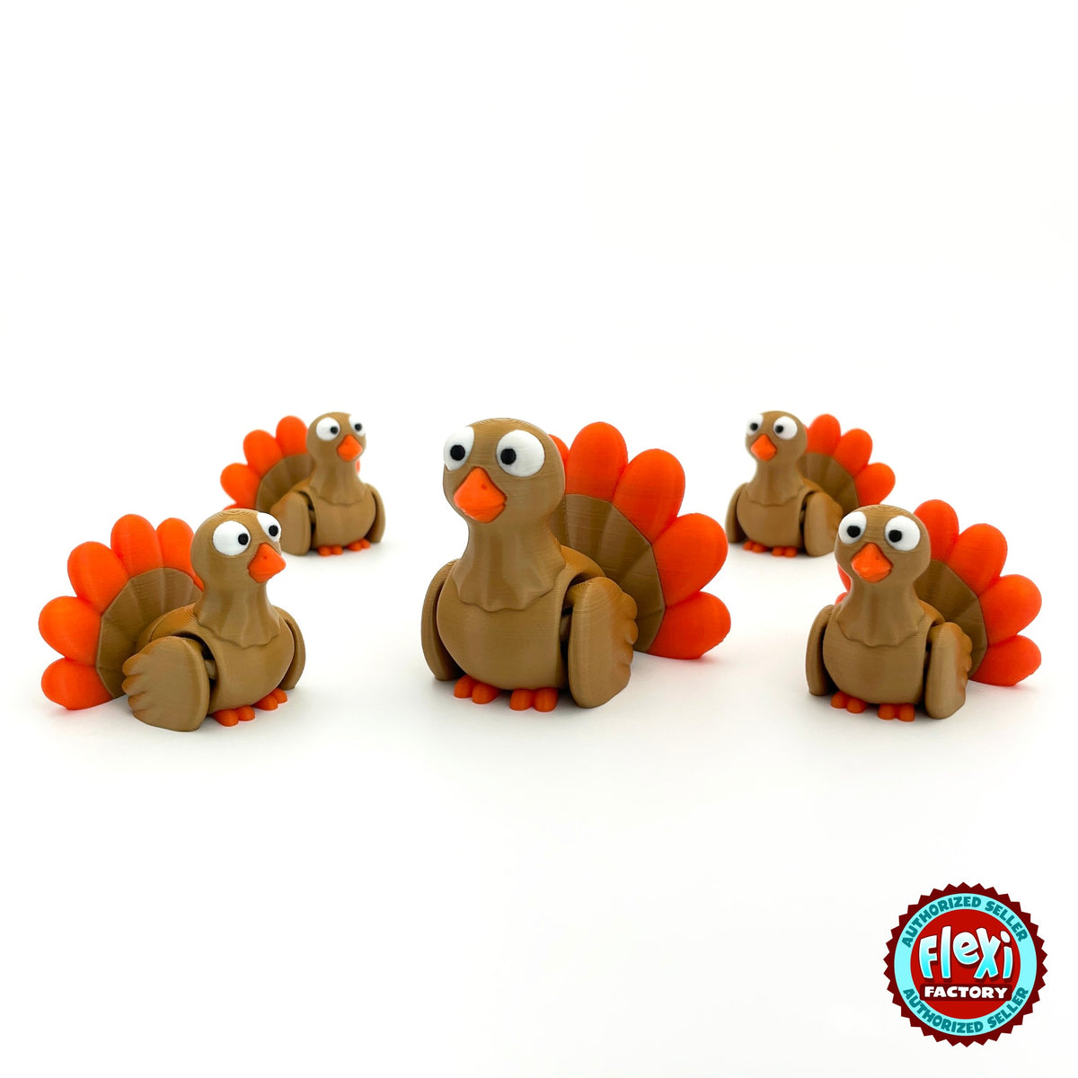 Cute turkey keychain, 3D printed by RU3D – group of turkeys. Brown with orange tail feathers.