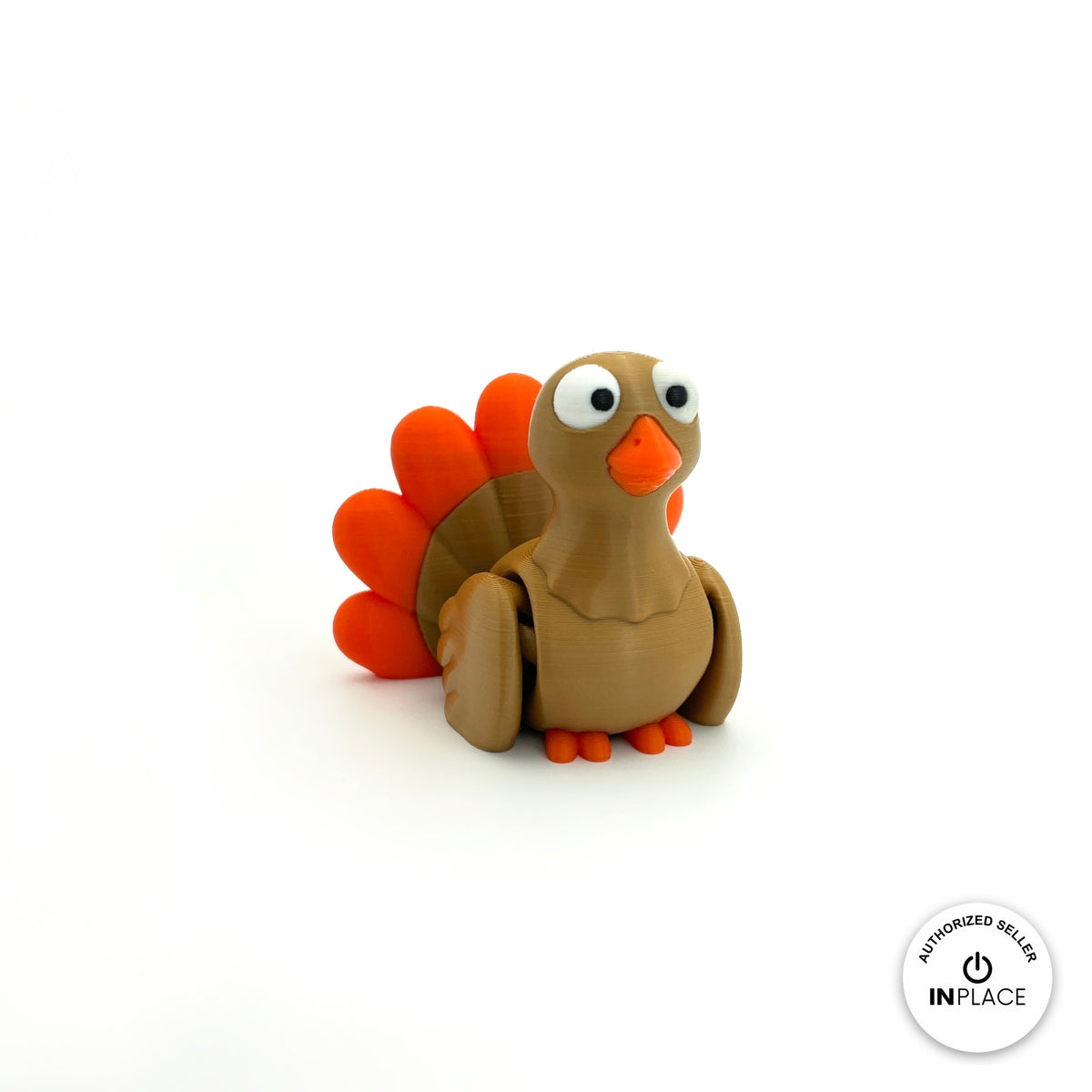 Cute turkey keychain, 3D printed by RU3D – three quarter view facing right. Brown with orange tail feathers.